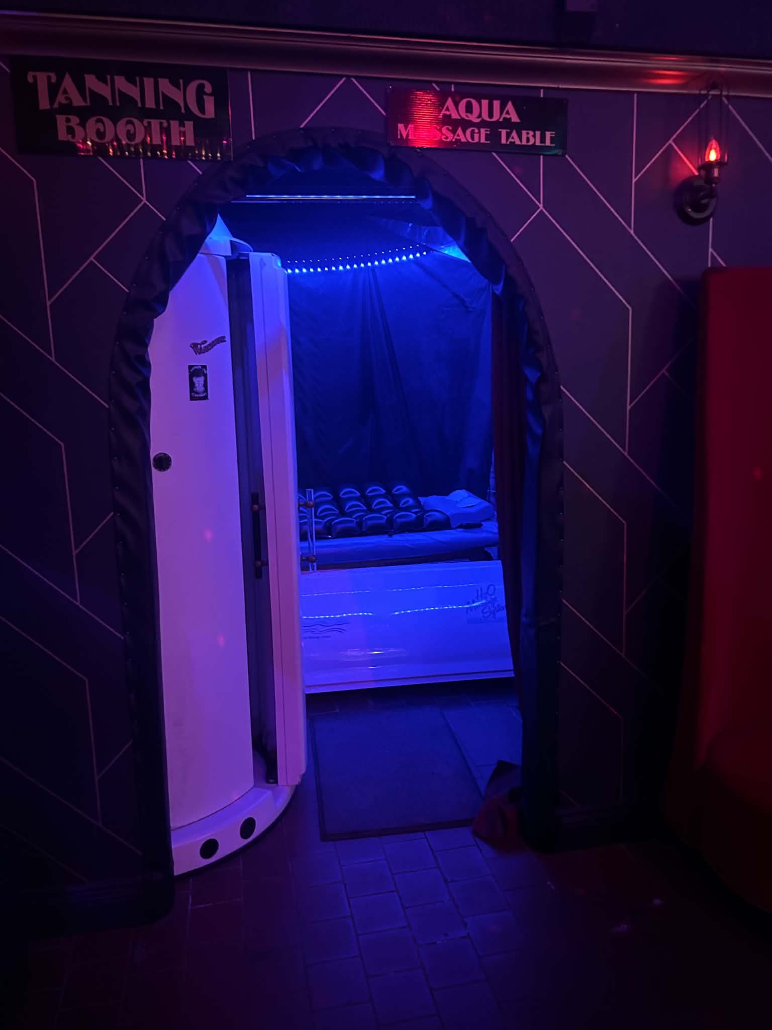 The tanning booth and aqua massage room